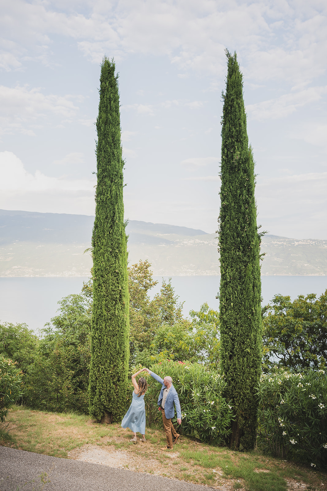 Abby and Will dancing beneath the cypresses